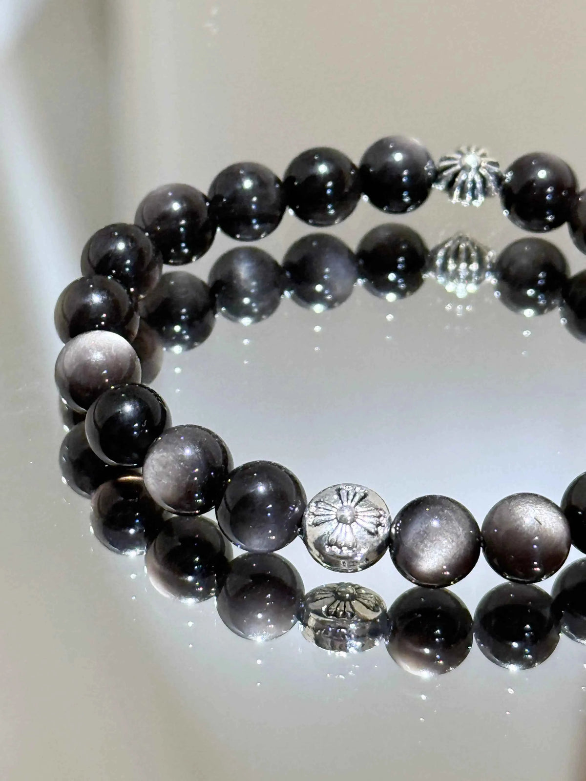 Elegant Silver Obsidian Bracelet: Unleash Protection and Style