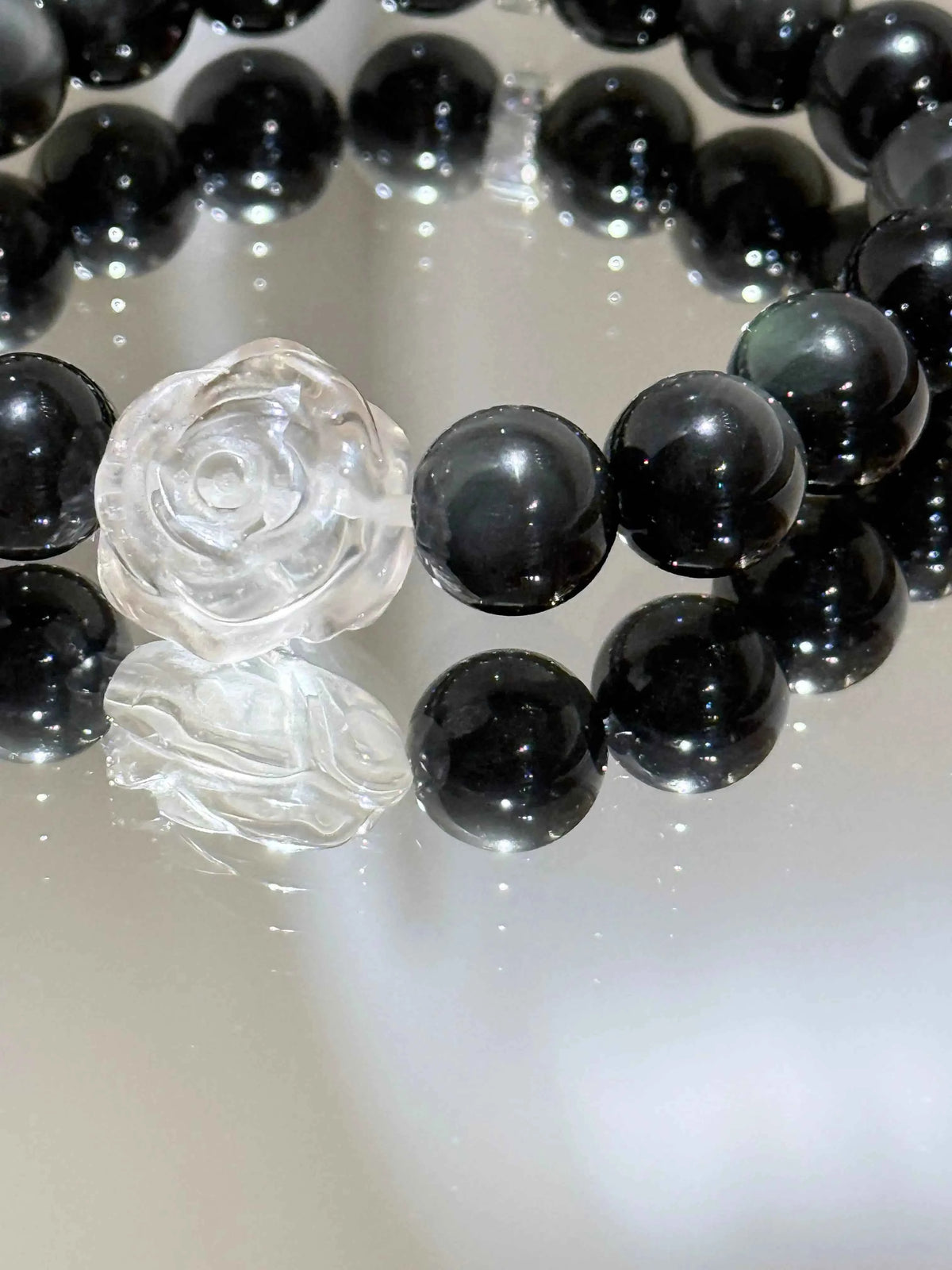 Revitalize Your Energy with the Rainbow Obsidian Clear Quartz Bracelet
